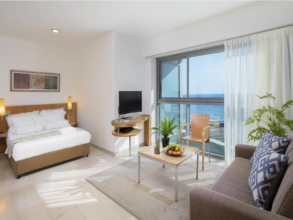 Aparthotel Okeanos On The Beach Herzelia Quarto foto
